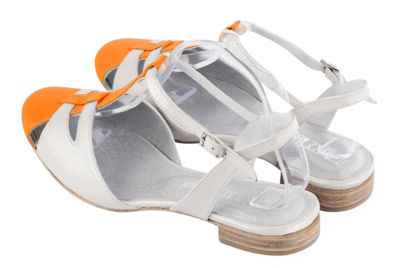Apricot orange and pure white women's open back T-strap shoes. Round toe. Flat leather soles. Rear view - Florence KOOIJMAN